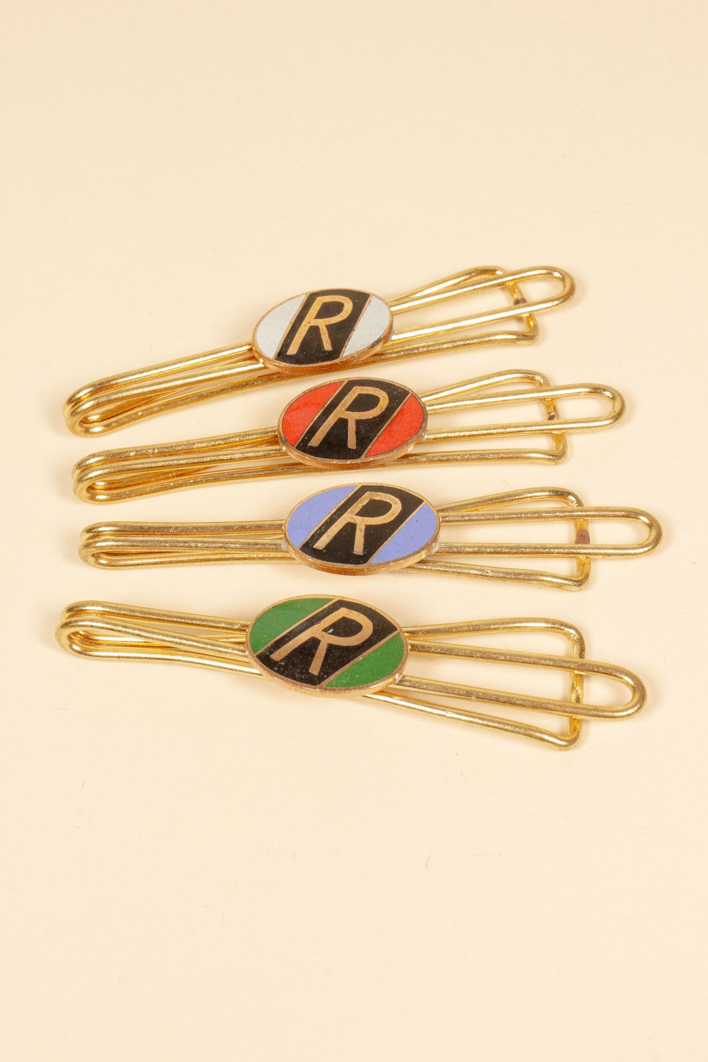 1930/1940s ENAMELED NEW OLD STOCK BRASS TIE CLIPS WITH INITIAL, LETTER "R"