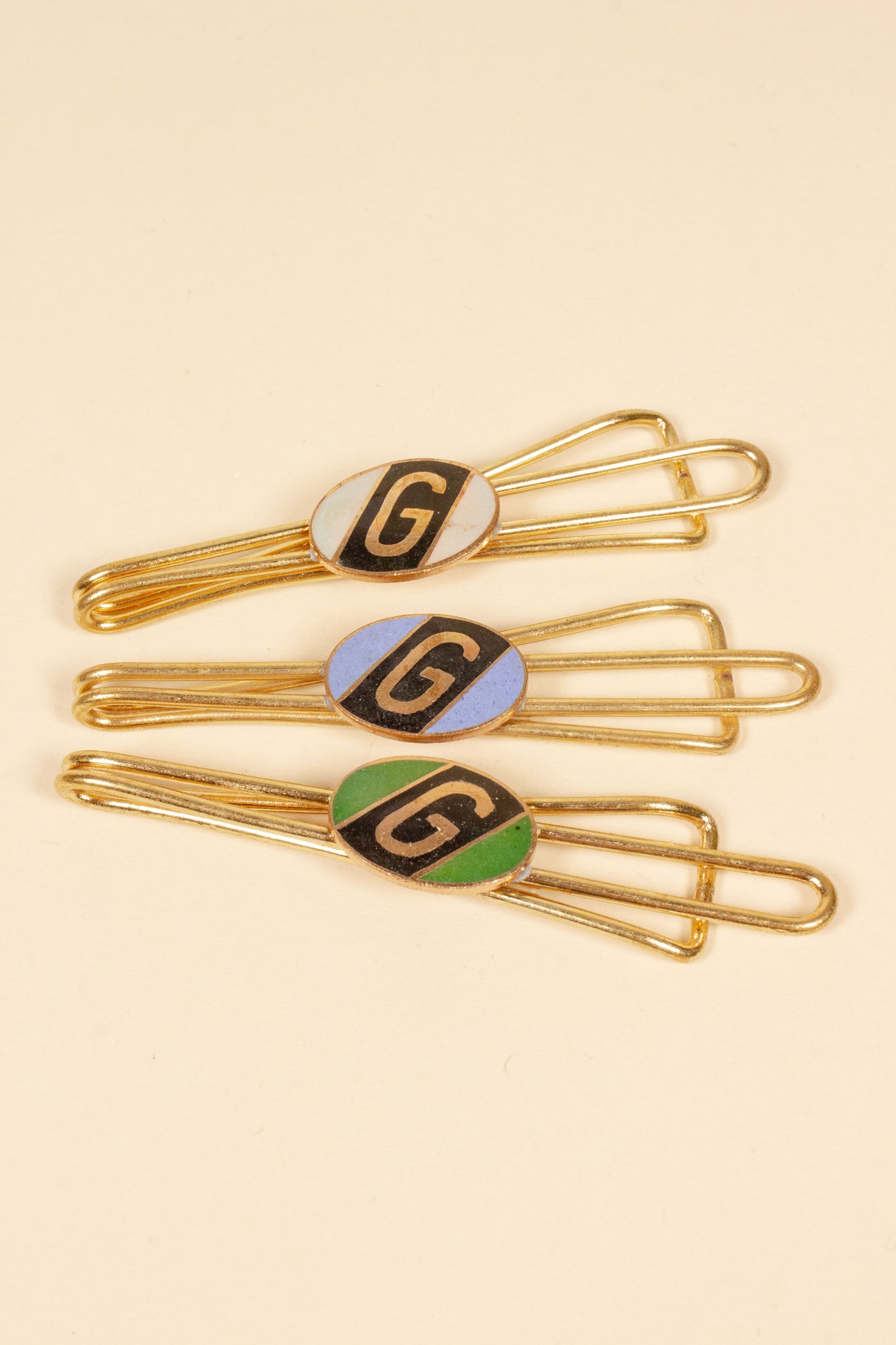 1930/1940s ENAMELED NEW OLD STOCK BRASS TIE CLIPS WITH INITIAL, LETTER "G"