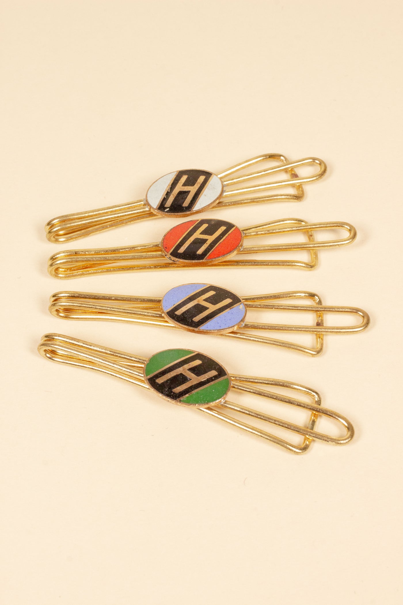 1930/1940s ENAMELED NEW OLD STOCK BRASS TIE CLIPS WITH INITIAL, LETTER "H"