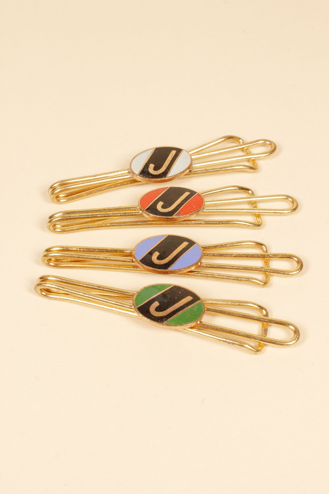 1930/1940s ENAMELED NEW OLD STOCK BRASS TIE CLIPS WITH INITIAL, LETTER "J"