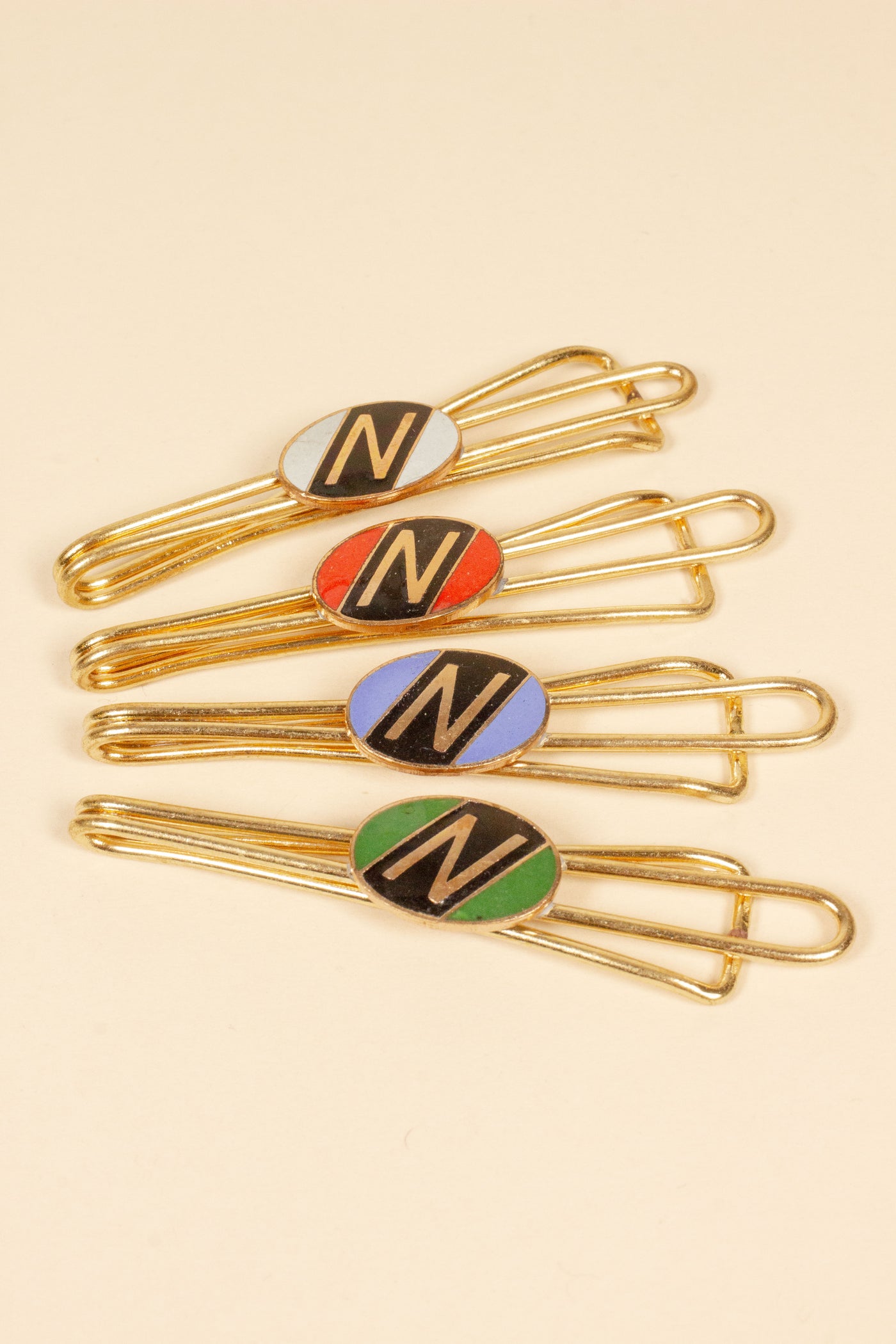 1930/1940s ENAMELED NEW OLD STOCK BRASS TIE CLIPS WITH INITIAL, LETTER "N"