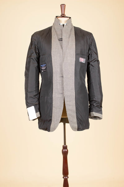 SWEDISH 1960S GREY TWO PIECE PRINCE OF WALES DEADSTOCK SUIT BY PINGVIN. SIZE CA EU 48