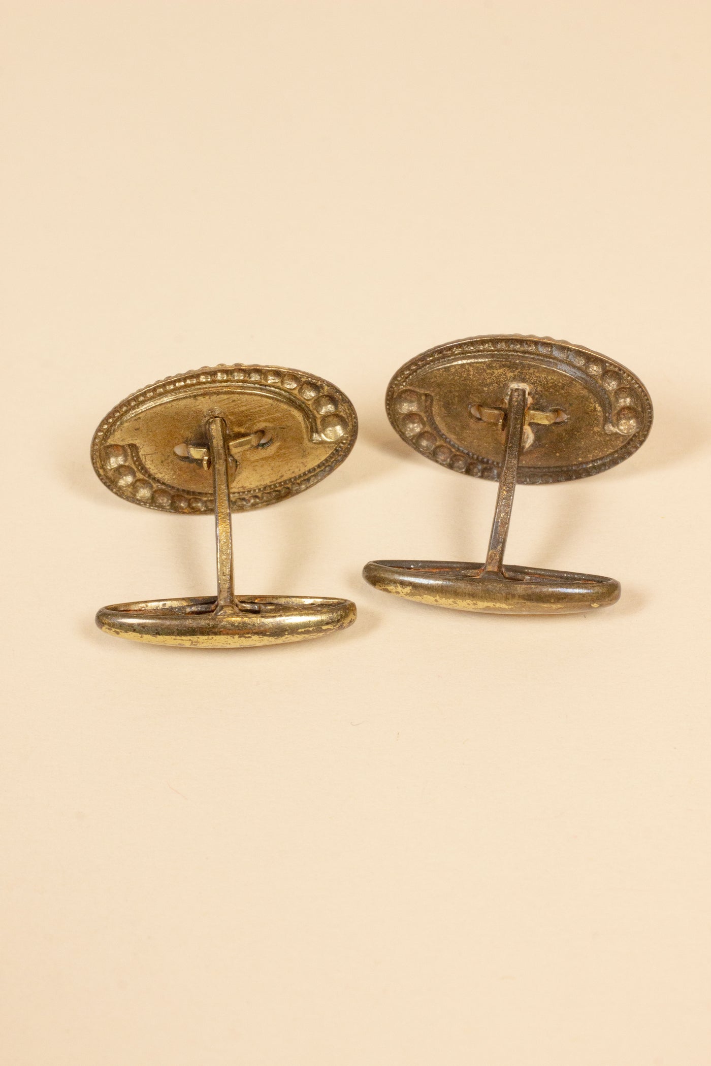 1910/1920'S BRASS CUFFLINKS WITH MOTHER-OF-PEARL INLAY