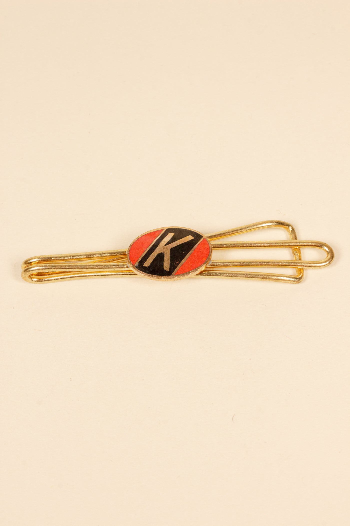 1930/1940s ENAMELED NEW OLD STOCK BRASS TIE CLIPS WITH INITIAL, LETTER "K"