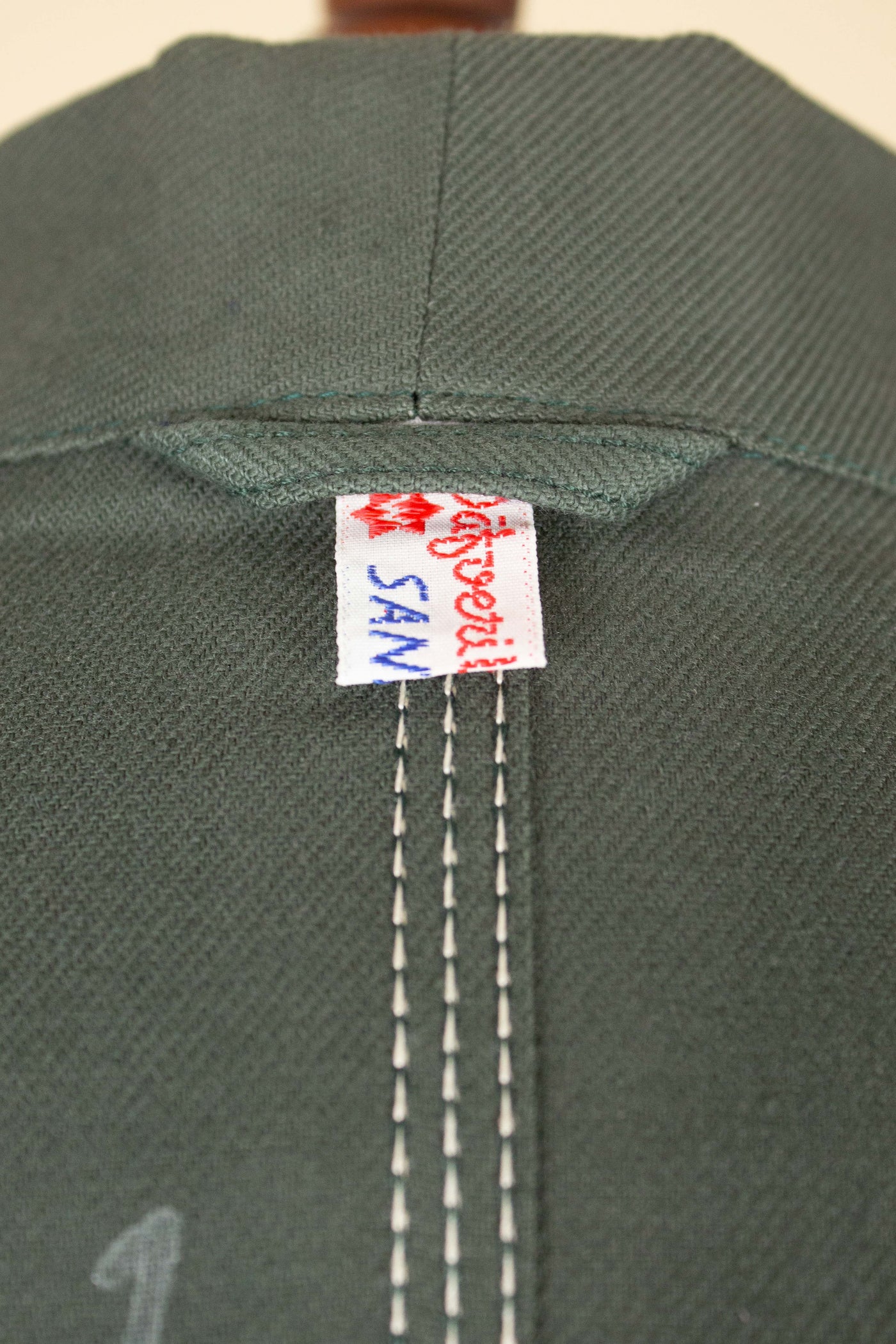 SWEDISH 1950S/1960S GREEN COTTON DEADSTOCK WORK COAT BY DALSTORPS YRKESKLÄDER. SIZE CA EU 50 LONG