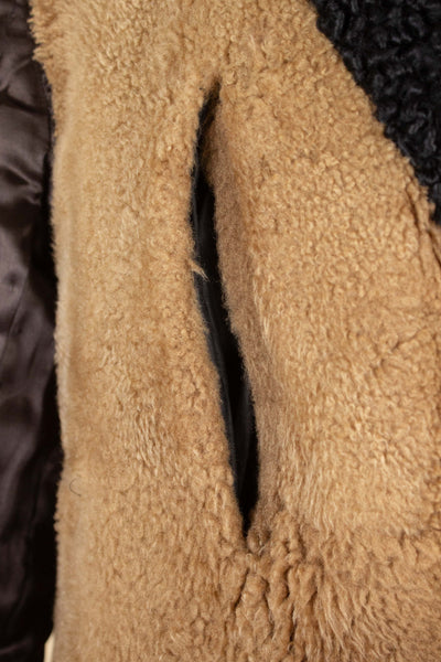 SWEDISH 1910S/1920S BLACK OVERCOAT WITH PERSIAN COLLAR AND FUR LINING, BY PAUL U. BERGSTRÖM. SIZE CA EU 48