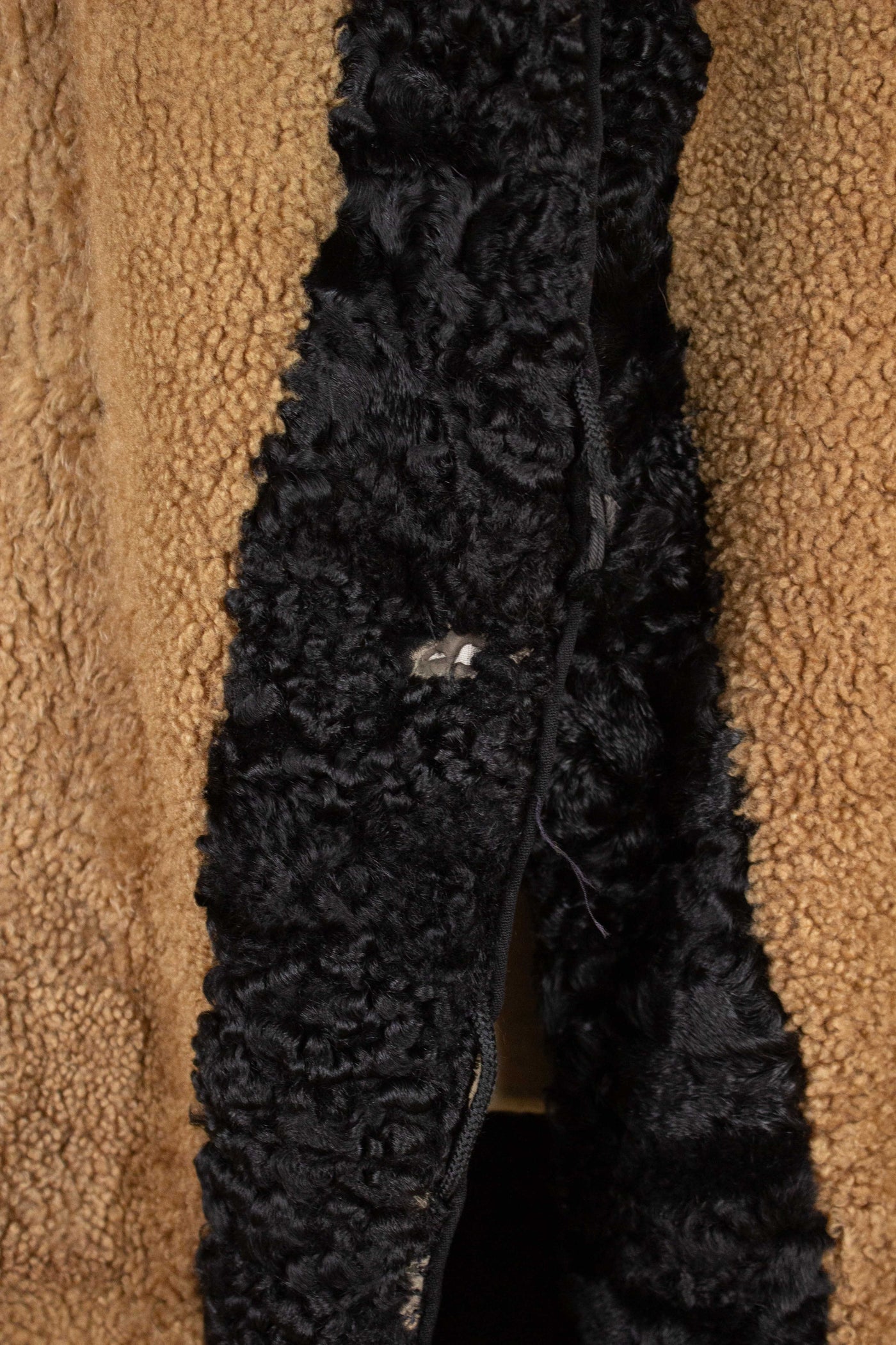 SWEDISH 1910S/1920S BLACK OVERCOAT WITH PERSIAN COLLAR AND FUR LINING, BY PAUL U. BERGSTRÖM. SIZE CA EU 48