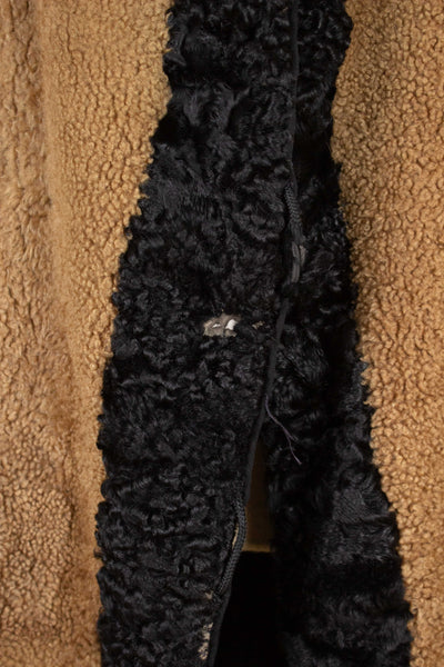 SWEDISH 1910S/1920S BLACK OVERCOAT WITH PERSIAN COLLAR AND FUR LINING, BY PAUL U. BERGSTRÖM. SIZE CA EU 48