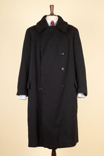 SWEDISH 1910S/1920S BLACK OVERCOAT WITH PERSIAN COLLAR AND FUR LINING, BY PAUL U. BERGSTRÖM. SIZE CA EU 48