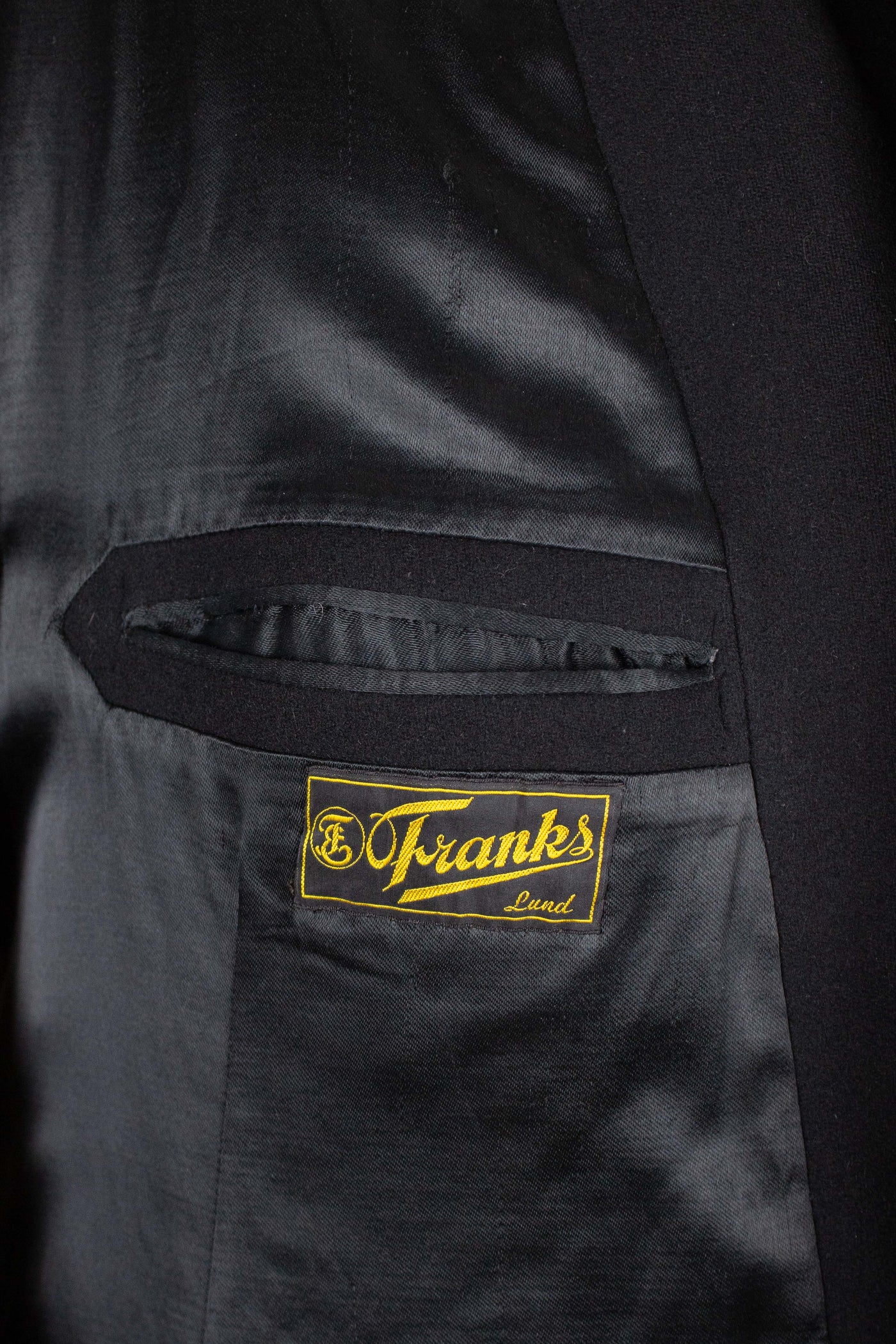 SWEDISH 1930S BLACK DOUBLE BREASTED OVERCOAT BY JUNEX. SIZE CA EU 46 LONG