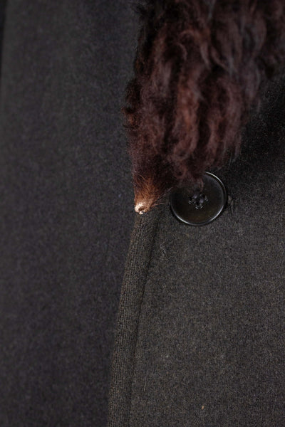 SWEDISH 1940S/1950S BLACK DOUBLE BREASTED SHORT OVERCOAT WITH FUR COLLAR AND LINING. SIZE CA EU 56