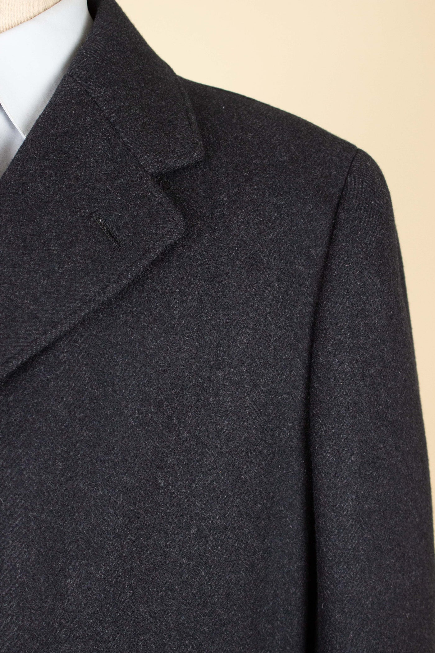SWEDISH 1940S/1950S DARK GREY HERRINGBONE SINGLE BREASTED OVERCOAT BY ELSON. SIZE CA 48 SHORT