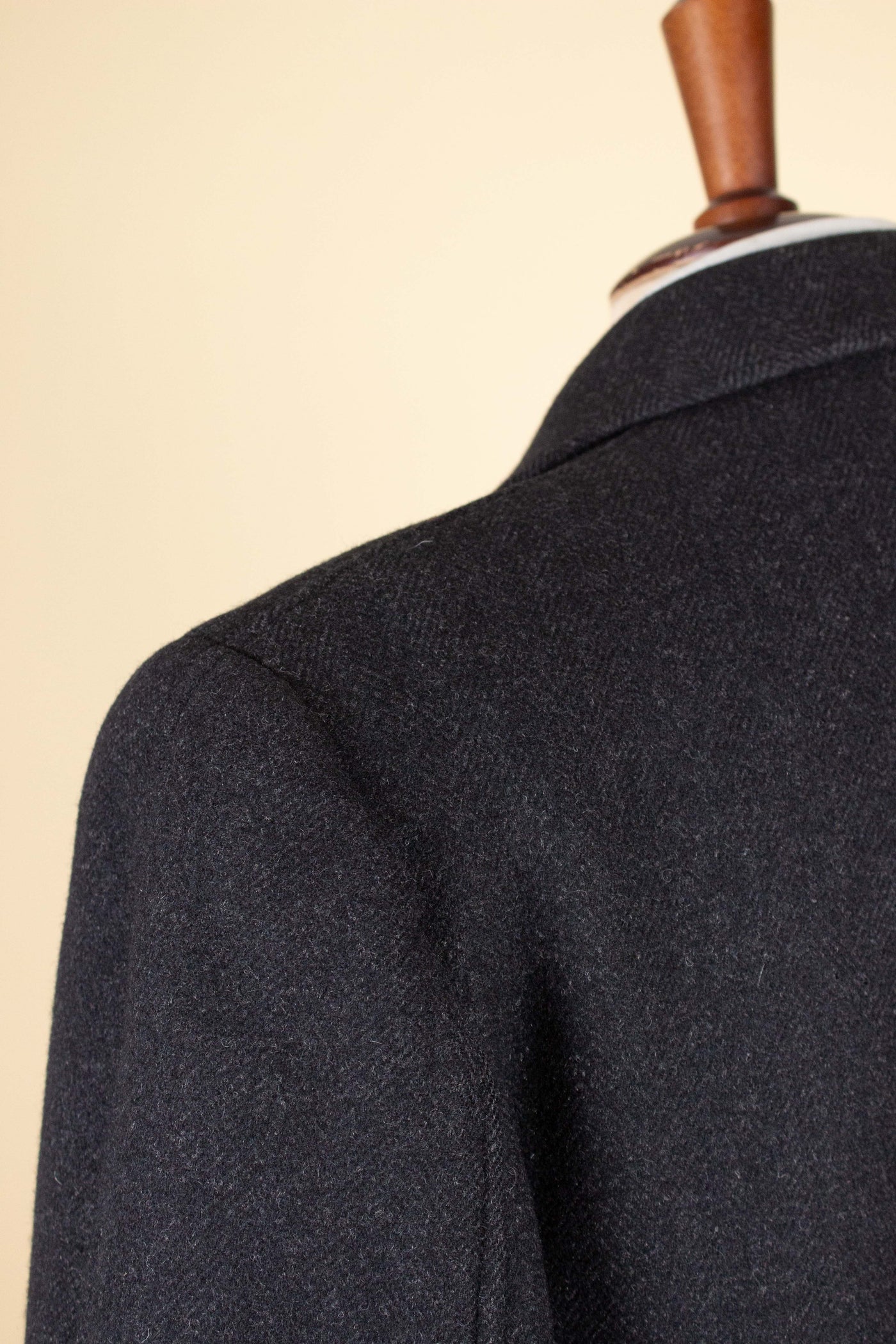 SWEDISH 1940S/1950S DARK GREY HERRINGBONE SINGLE BREASTED OVERCOAT BY ELSON. SIZE CA 48 SHORT