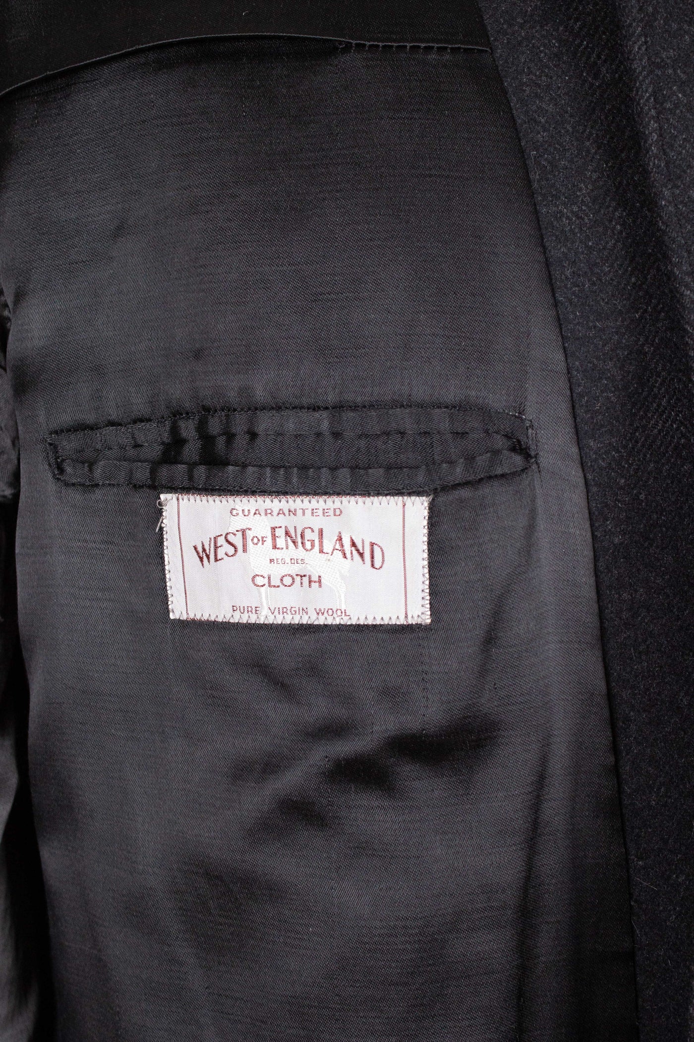 SWEDISH 1940S/1950S DARK GREY HERRINGBONE SINGLE BREASTED OVERCOAT BY ELSON. SIZE CA 48 SHORT