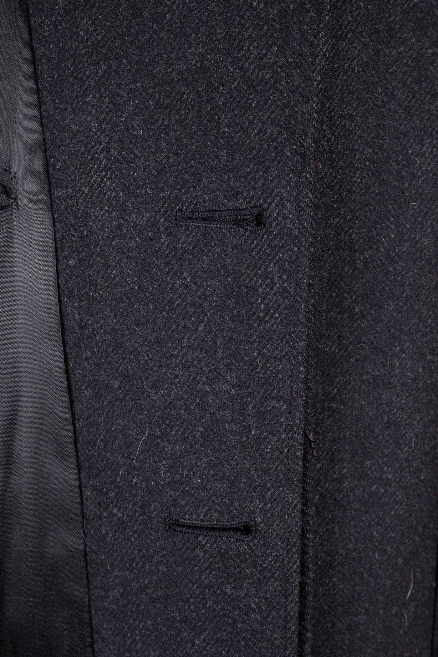 SWEDISH 1940S/1950S DARK GREY HERRINGBONE SINGLE BREASTED OVERCOAT BY ELSON. SIZE CA 48 SHORT