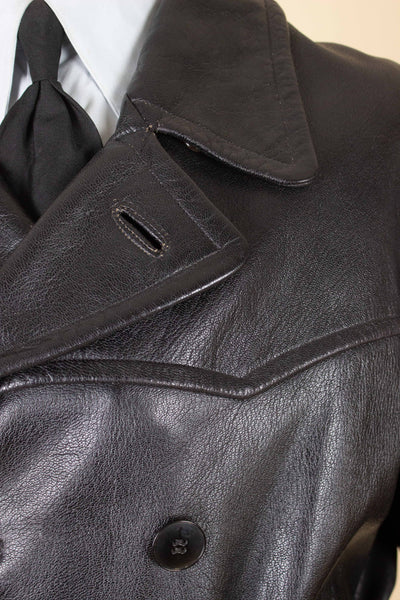 SWEDISH 1940S BLACK DOUBLE BREASTED BELTED GOATSKIN JACKET BY L.F. EMILSSON. SIZE CA EU 52
