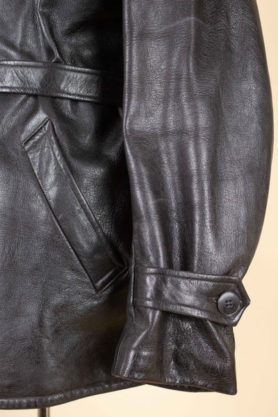 SWEDISH 1940S BLACK DOUBLE BREASTED BELTED GOATSKIN JACKET BY L.F. EMILSSON. SIZE CA EU 52