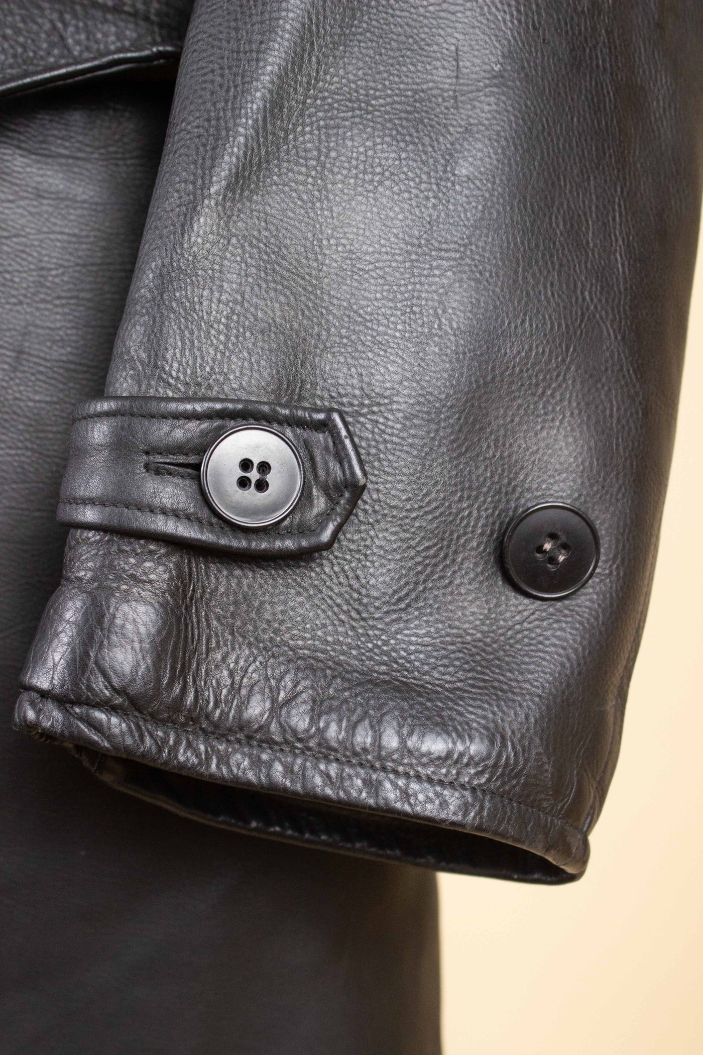 SWEDISH 1940S/1950S BLACK DOUBLE BREASTED GOATSKIN JACKET WITH FUR COLLAR. SIZE CA EU 46 LONG