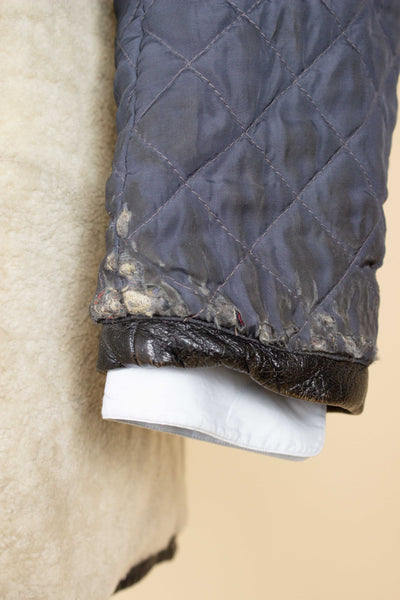 SWEDISH 1950S/1960S BLACK GOATSKIN JACKET WITH WHITE SHEARLING LINING. SIZE CA EU 50