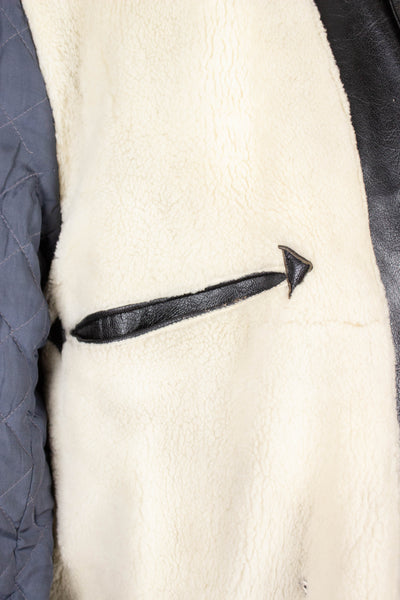 SWEDISH 1950S/1960S BLACK GOATSKIN JACKET WITH WHITE SHEARLING LINING. SIZE CA EU 50