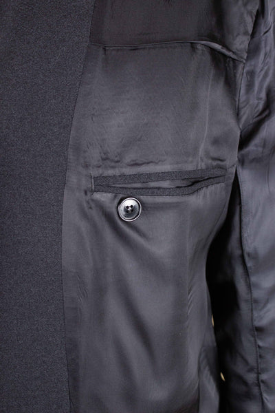 1960S SWEDISH DARK GREY SINGLE BREASTED TWO PIECE SUIT BY G. THULIN. SIZE CA EU 56
