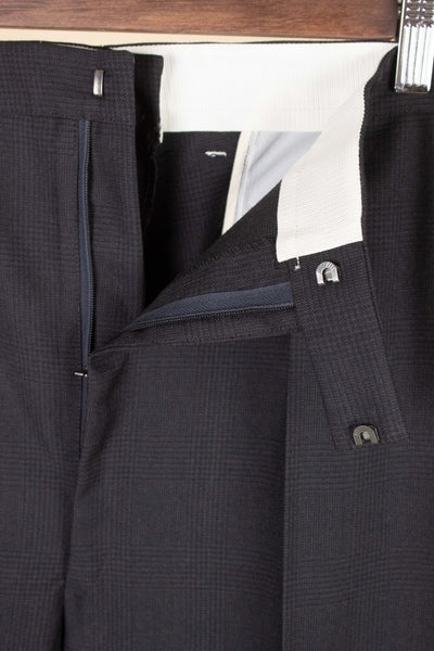 SWEDISH 1960S DARK GREY TWO PIECE SINGLE BREASTED DEADSTOCK SUIT BY UNKNOWN MAKER. SIZE CA EU 48