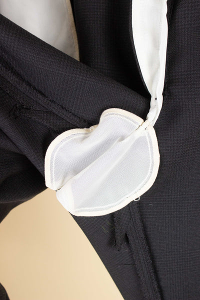 SWEDISH 1960S DARK GREY TWO PIECE SINGLE BREASTED DEADSTOCK SUIT BY UNKNOWN MAKER. SIZE CA EU 48