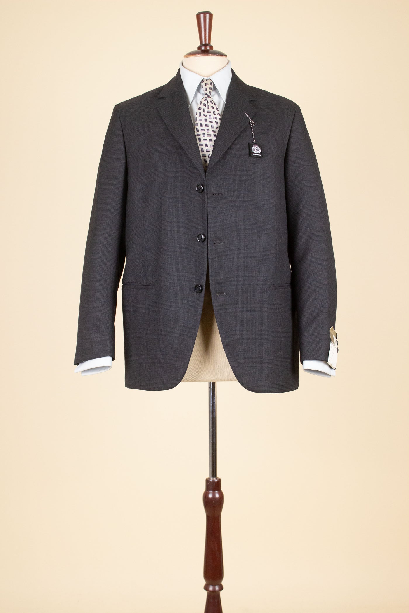 SWEDISH 1960S DARK GREY TWO PIECE SINGLE BREASTED DEADSTOCK SUIT BY UNKNOWN MAKER. SIZE CA EU 48