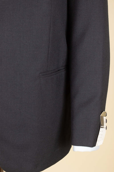 SWEDISH 1960S DARK GREY TWO PIECE SINGLE BREASTED DEADSTOCK SUIT BY UNKNOWN MAKER. SIZE CA EU 48