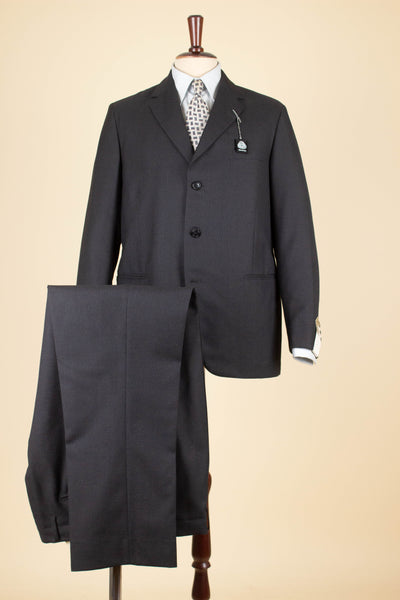 SWEDISH 1960S DARK GREY TWO PIECE SINGLE BREASTED DEADSTOCK SUIT BY UNKNOWN MAKER. SIZE CA EU 48
