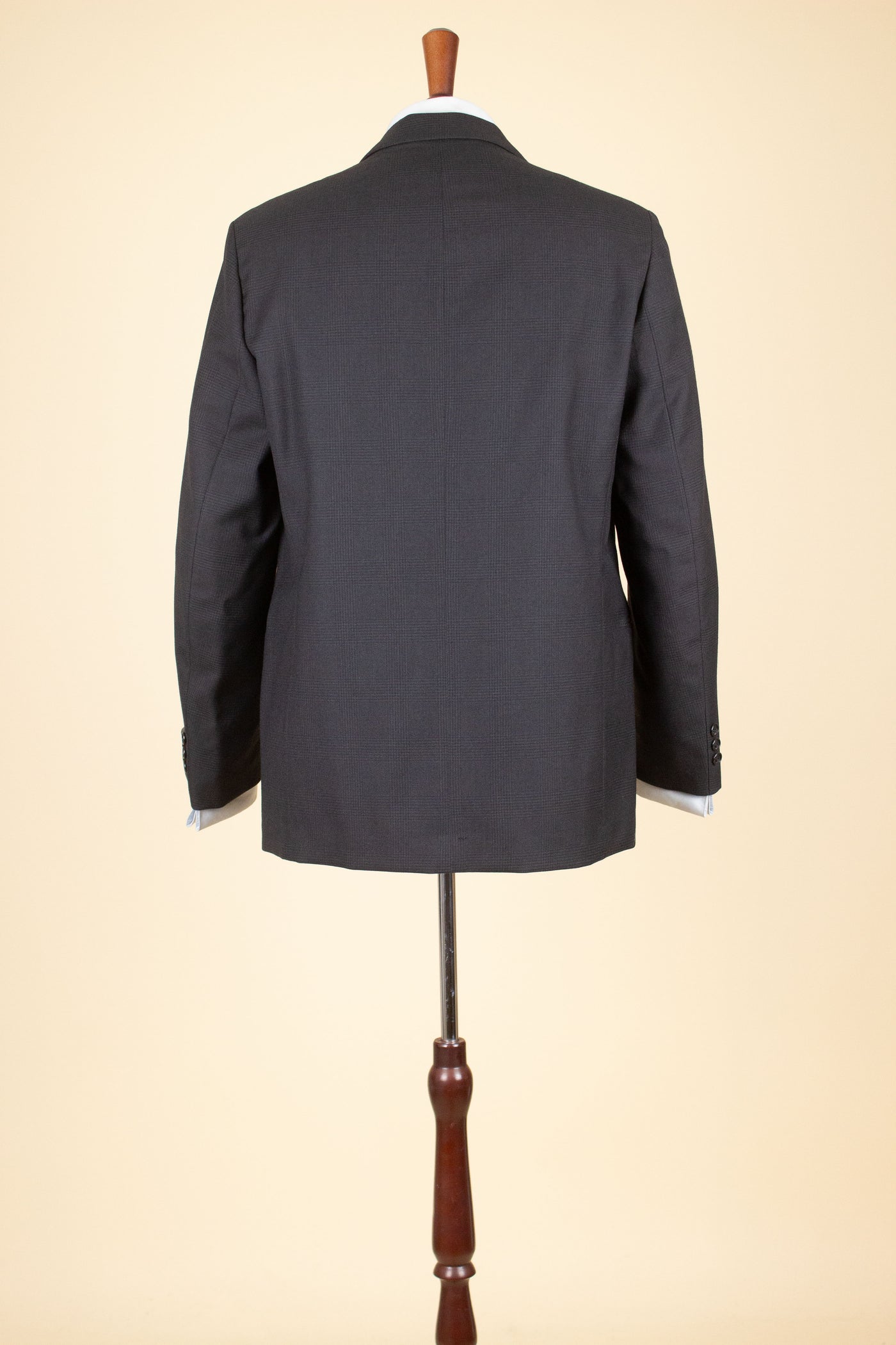 SWEDISH 1960S DARK GREY TWO PIECE SINGLE BREASTED DEADSTOCK SUIT BY UNKNOWN MAKER. SIZE CA EU 48
