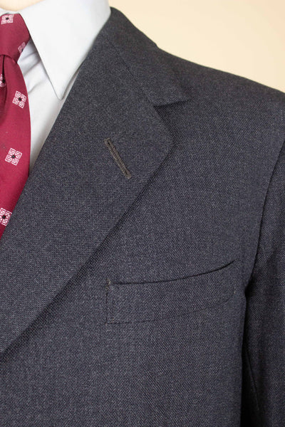 BRITISH 1961 DARK GREY TWO PIECE SINGLE BREASTED SUIT BY ANDERSON & SHEPPARD. SIZE CA EU 48