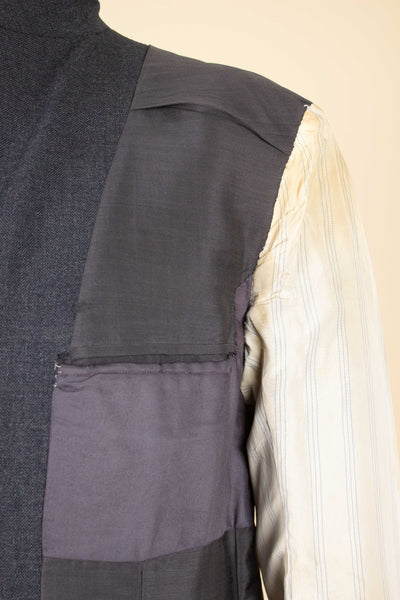 BRITISH 1961 DARK GREY TWO PIECE SINGLE BREASTED SUIT BY ANDERSON & SHEPPARD. SIZE CA EU 48