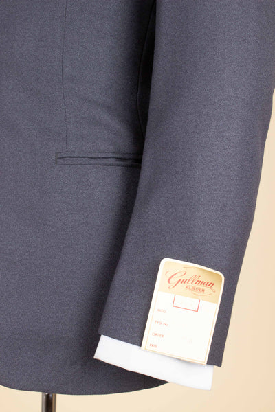SWEDISH 1950S DEADSTOCK MID GREY TWO PIECE SINGLE BREASTED SUIT BY GULLMAN. SIZE CA EU 44