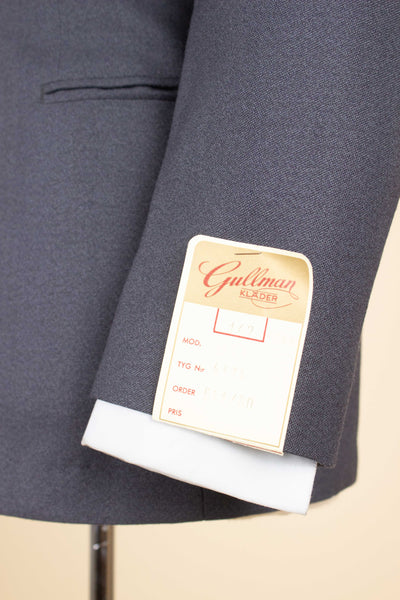 SWEDISH 1950S DEADSTOCK MID GREY TWO PIECE SINGLE BREASTED SUIT BY GULLMAN. SIZE CA EU 44