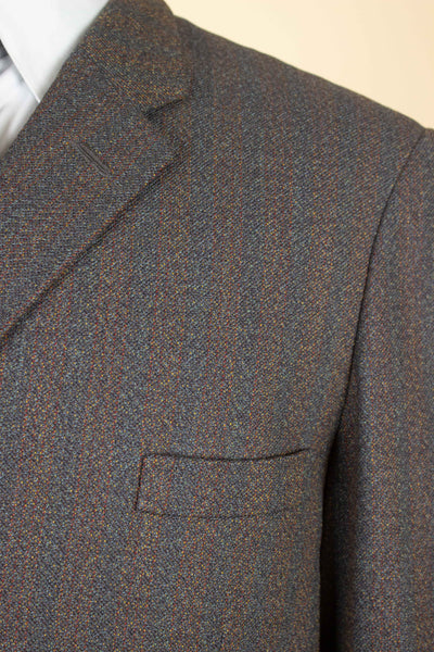 BRITISH 1950S/1960S BROWN-GREEN TWO PIECE SINGLE BREASTED BESPOKE SUIT. SIZE CA EU 52-54