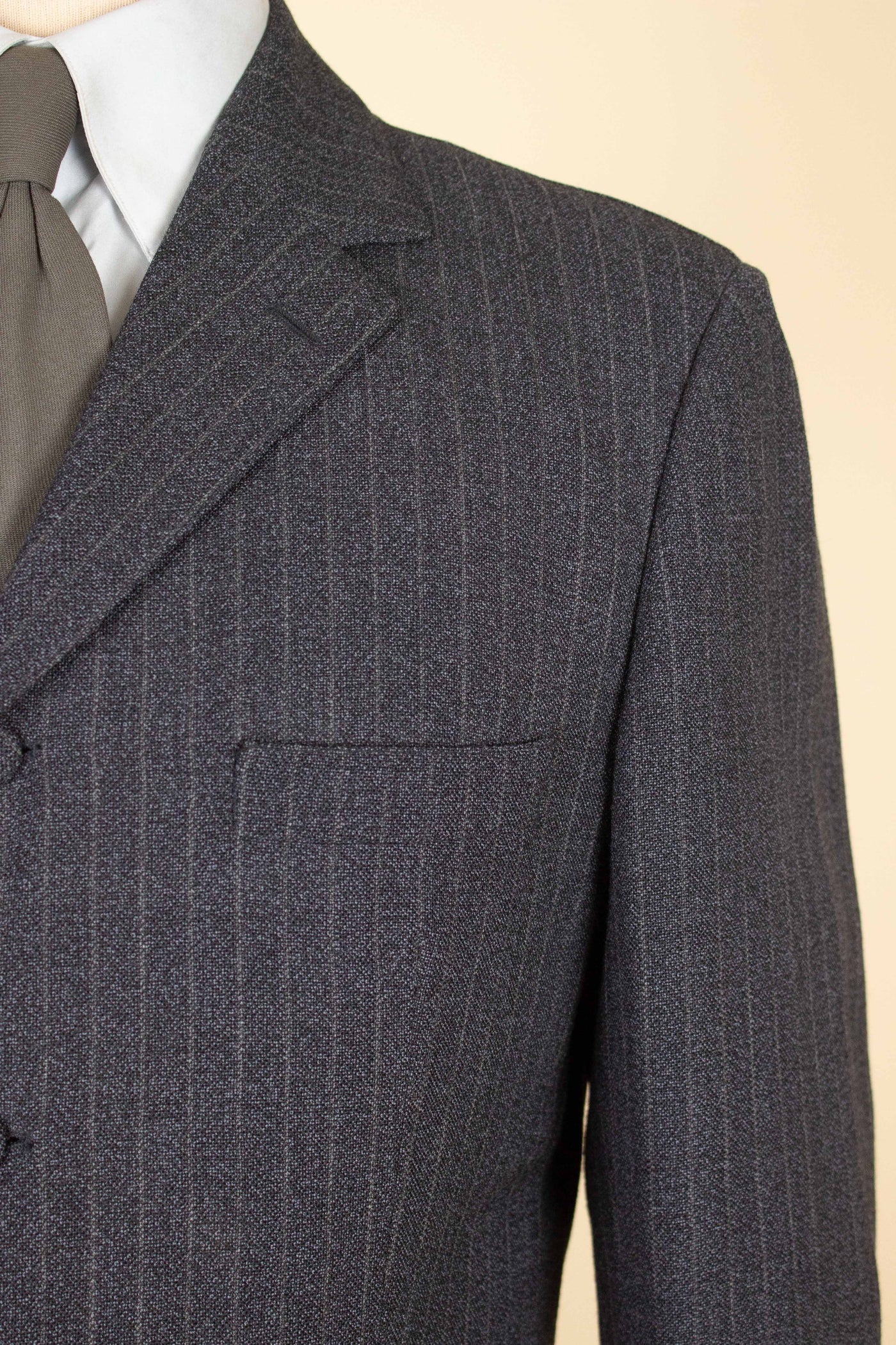 SWEDISH 1960S DARK GREY PINSTRIPED SINGLE BREASTED SUIT BY MAGNI. SIZE CA EU 48