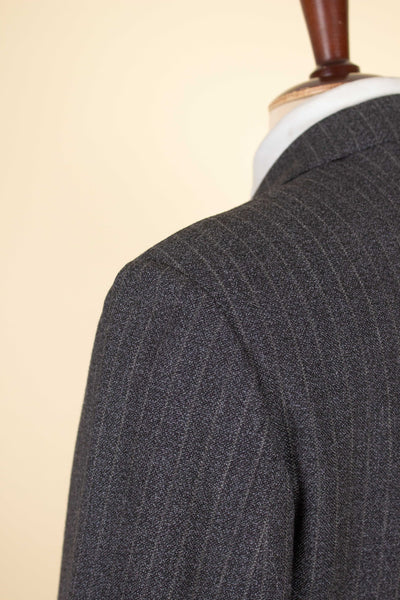 SWEDISH 1960S DARK GREY PINSTRIPED SINGLE BREASTED SUIT BY MAGNI. SIZE CA EU 48