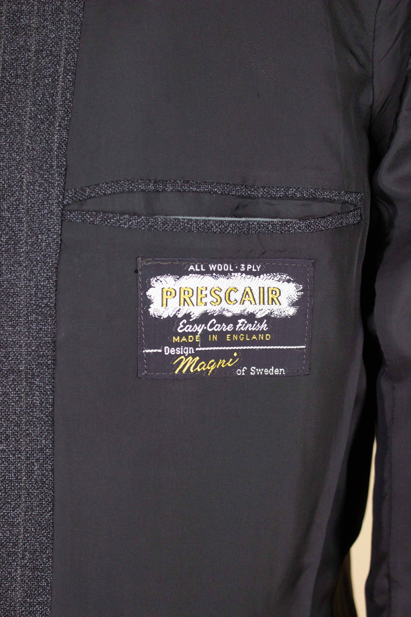 SWEDISH 1960S DARK GREY PINSTRIPED SINGLE BREASTED SUIT BY MAGNI. SIZE CA EU 48