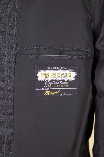 SWEDISH 1960S DARK GREY PINSTRIPED SINGLE BREASTED SUIT BY MAGNI. SIZE CA EU 48
