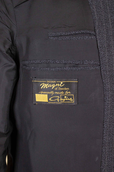 SWEDISH 1960S DARK GREY PINSTRIPED SINGLE BREASTED SUIT BY MAGNI. SIZE CA EU 48