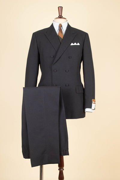 SWEDISH 1960S BLACK TWO PIECE DOUBLE BREASTED DEADSTOCK SUIT BY STRANDS. SIZE CA EU 50