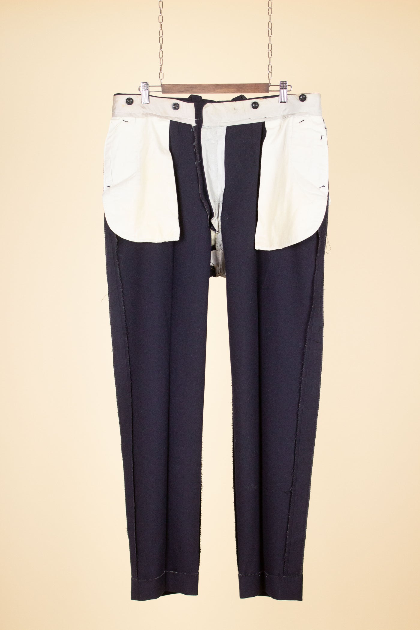 SWEDISH 1940S DARK BLUE SINGLE PLEATED TROUSERS WITH BUTTONS FOR BRACES. SIZE CA EU 52