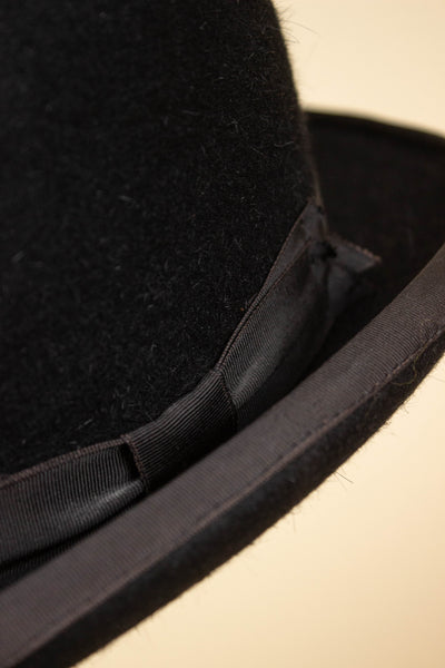 BRITISH 1950S/1960S BLACK BOWLER HAT BY CHRISTYS. SIZE 57