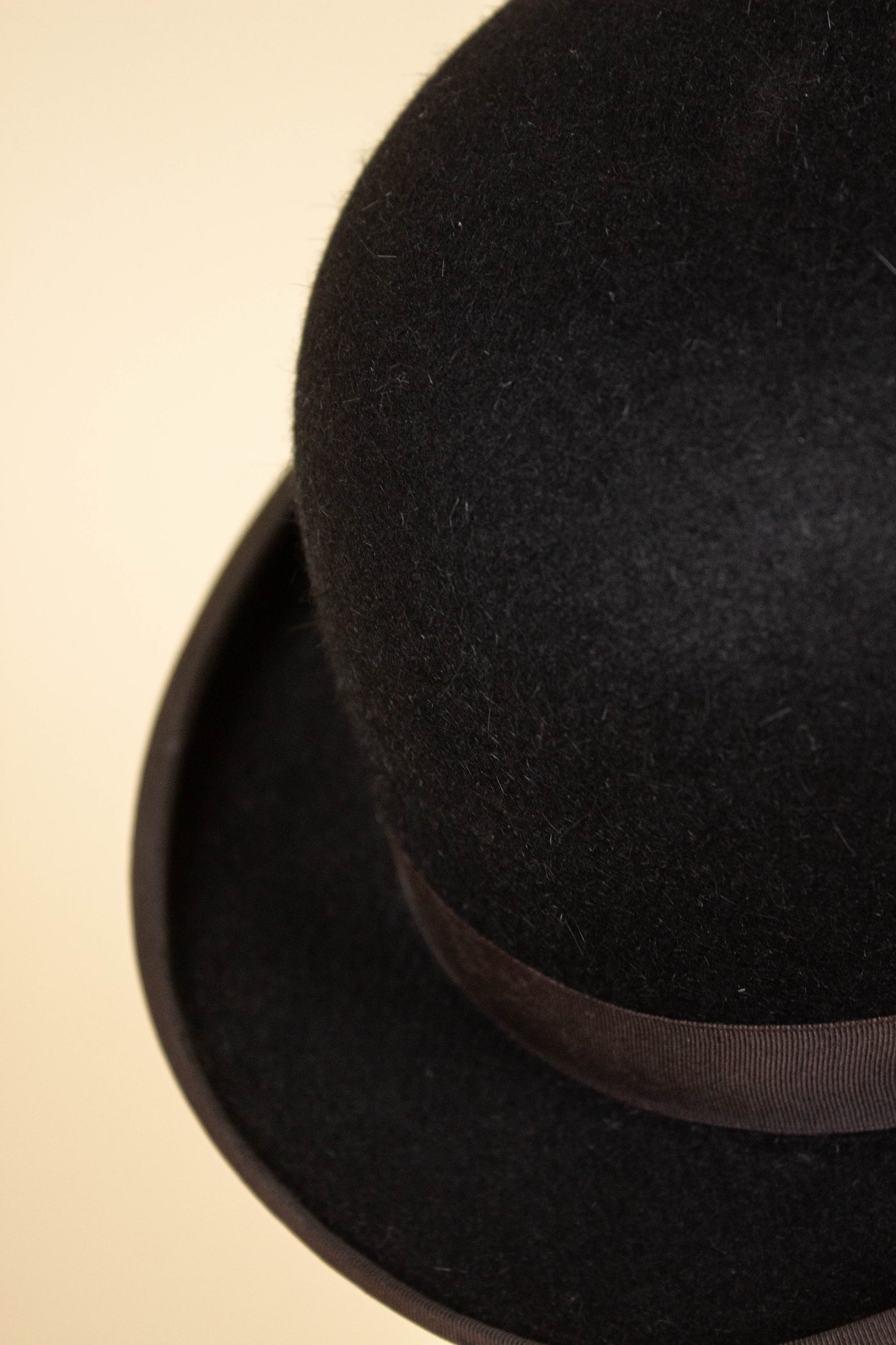 BRITISH 1950S/1960S BLACK BOWLER HAT BY CHRISTYS. SIZE 57