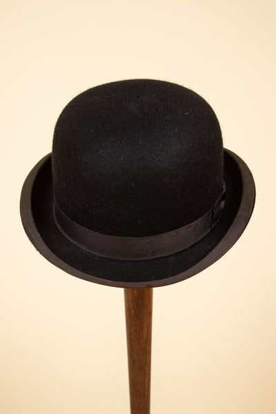 BRITISH 1950S/1960S BLACK BOWLER HAT BY CHRISTYS. SIZE 57