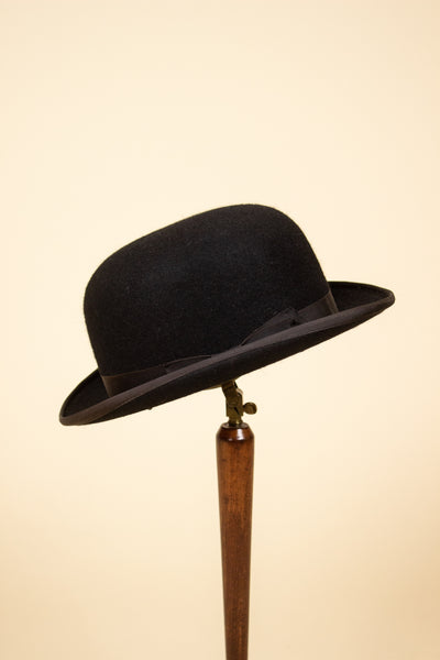 BRITISH 1950S/1960S BLACK BOWLER HAT BY CHRISTYS. SIZE 57