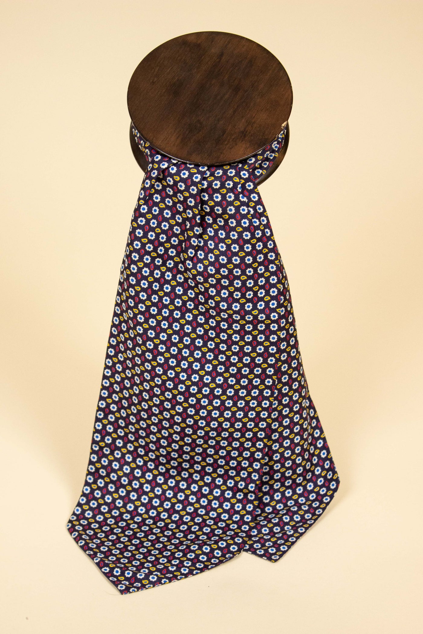 ITALIAN 100%SILK DARK BLUE ASCOT TIE WITH SMALL YELLOW, WHITE, RED AND BLUE PAISLEY PATTERN