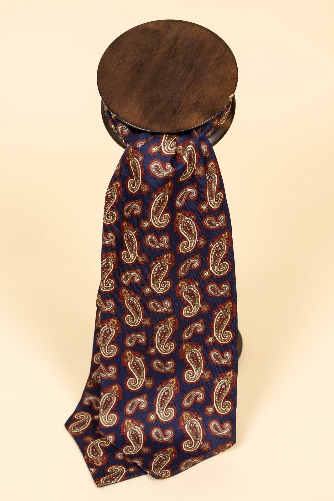 ITALIAN 100% SILK DARK BLUE ASCOT TIE WITH RED, WHITE, YELLOW AND BEIGE PAISLEY PATTERN