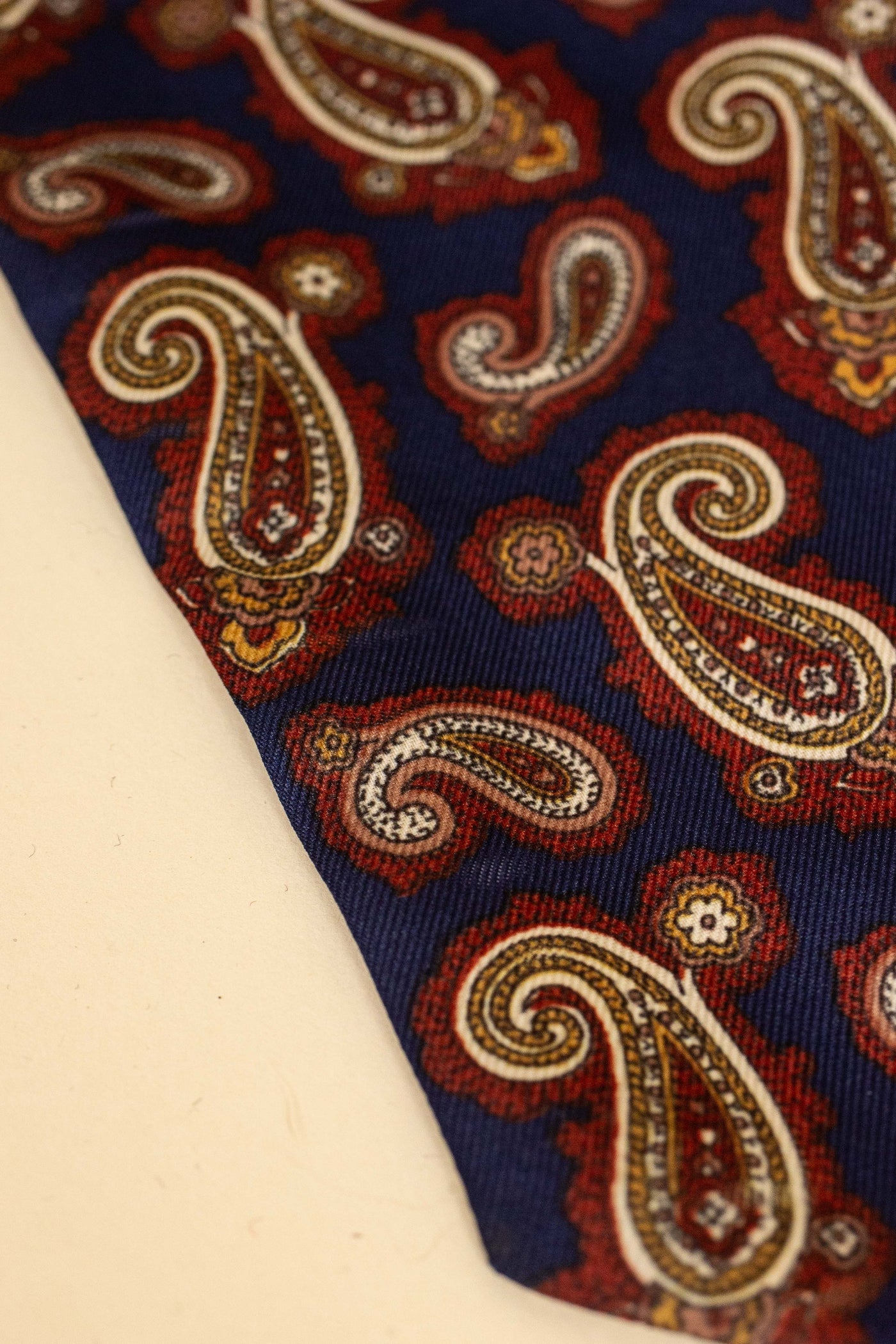 ITALIAN 100% SILK DARK BLUE ASCOT TIE WITH RED, WHITE, YELLOW AND BEIGE PAISLEY PATTERN